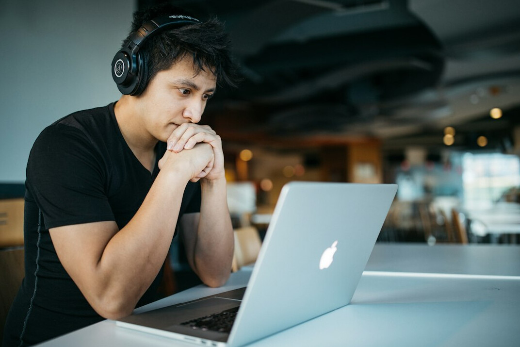 young person using laptop
