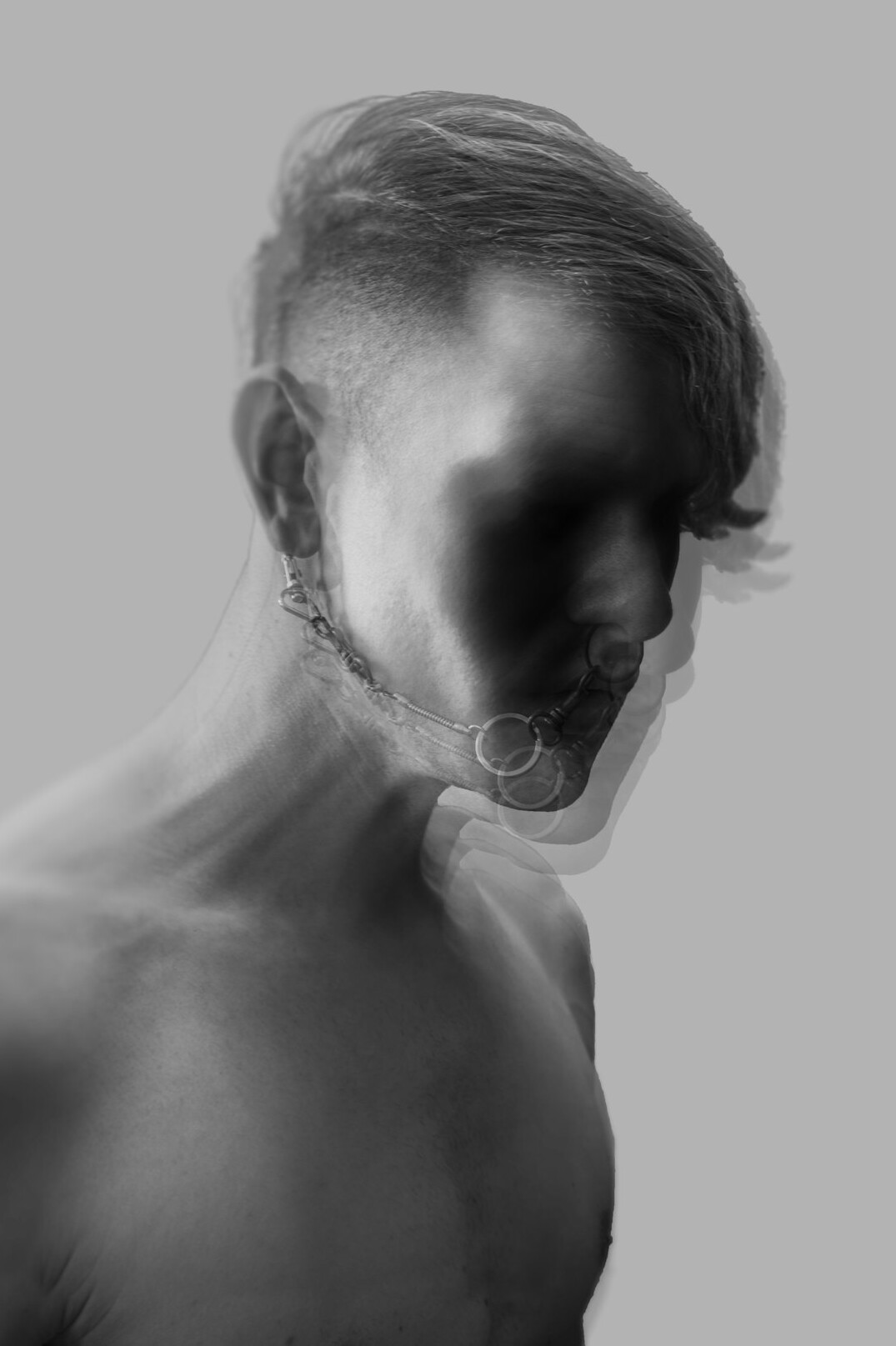 Studio portrait of a man with short hair